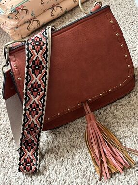 Women’s Brown Leather Crossbody Bag with Tassel and Decorative Strap